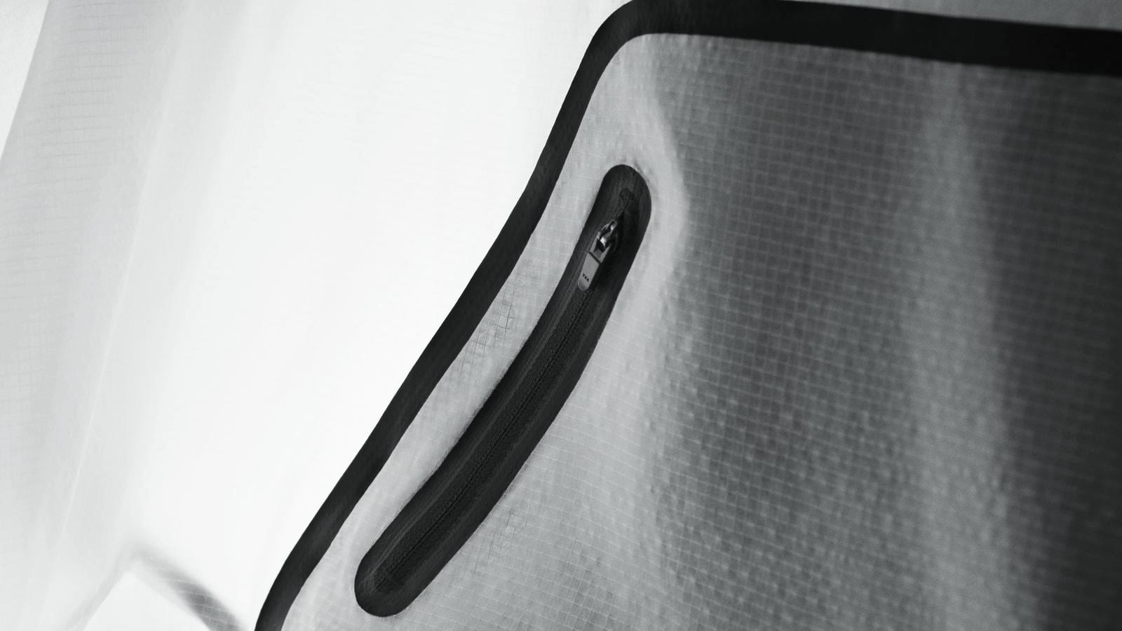Close view of a bonded pocket on a technical shell fabric